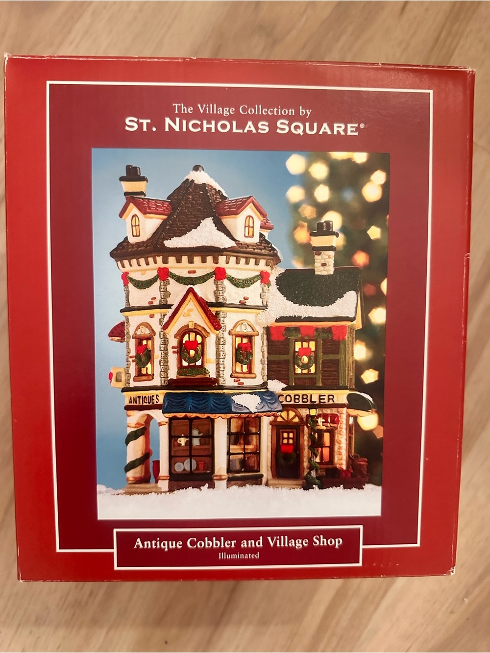 St. Nicholas Square Red and White Antique Cobbler & Village Shop Figurine